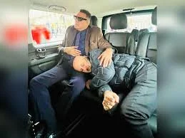 Boman Irani asks 'why' as Anupam Kher takes a nap on his lap